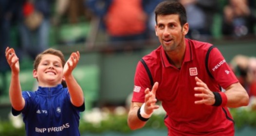 ROLAN GAROS - 11. DAN: Novak pobedio kišu, nervozu i Roberta Bautistu Aguta 